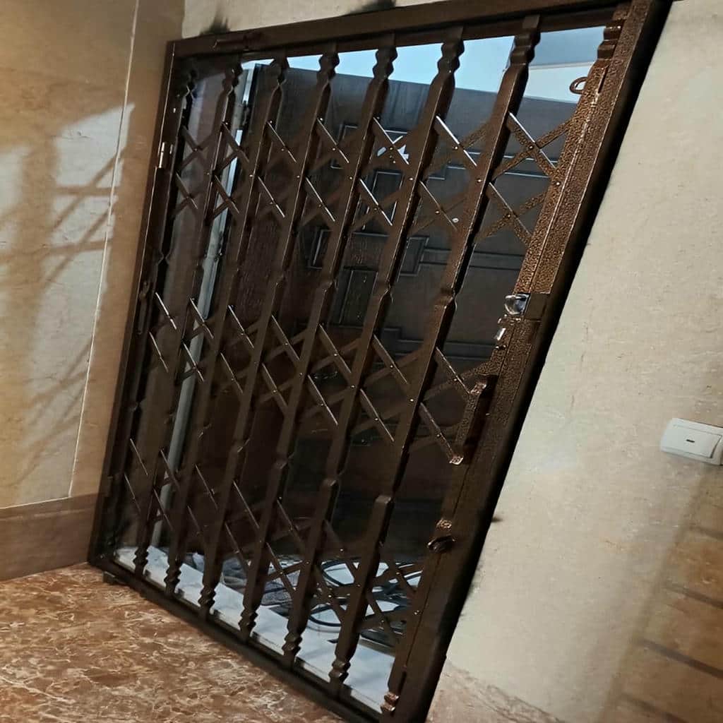قفل درب آکاردئونی با زبانه محکم