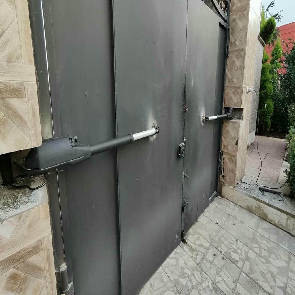 تعمیر جک درب پارکینگ در محل با گیربکس سرویس شده