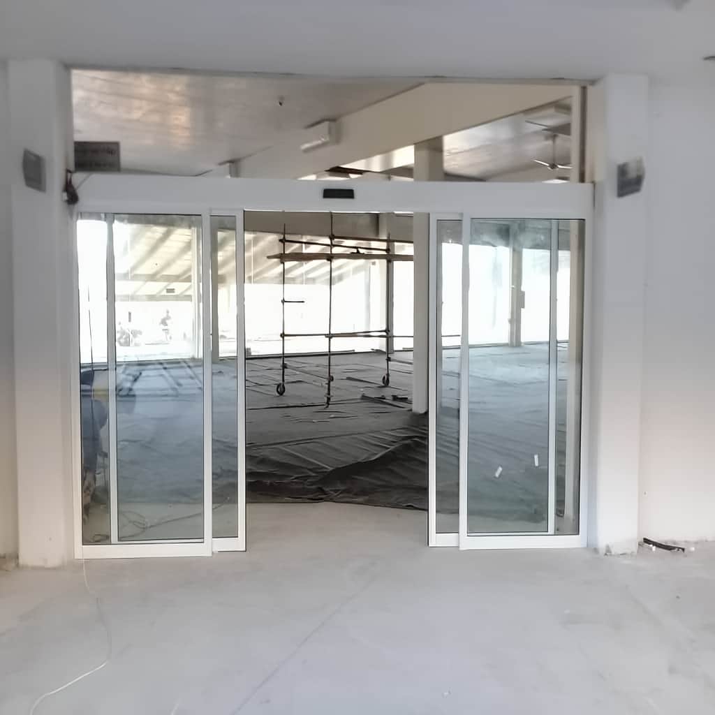 نصب درب اتوماتیک شیشه ای لوکس هتلینگ با ریل تراز