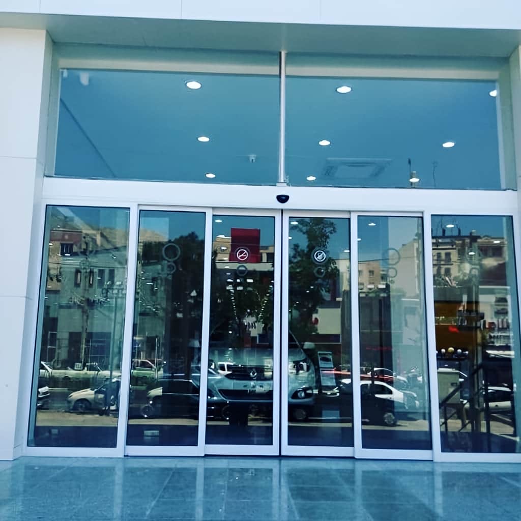 نصب درب اتوماتیک شیشه ای هتل لابی با ریل تراز