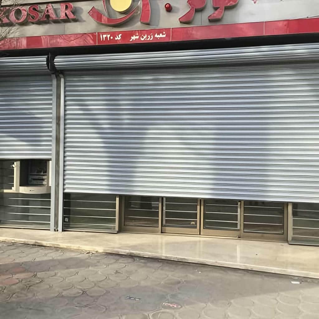 قیمت کرکره برقی رنگی نمای فروشگاه بر اساس ابعاد سفارش