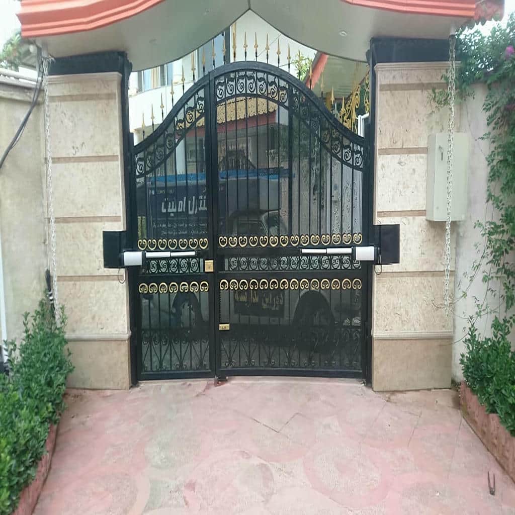 درب برقی پارکینگ ریلی برای ورودی مسکونی و اداری