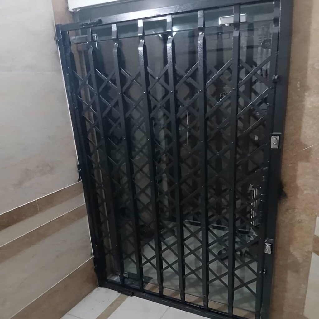 درب آکاردئونی آپارتمان فلزی با طراحی کشویی ورودی خانه