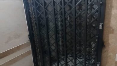 درب آکاردئونی آپارتمان فلزی با طراحی کشویی ورودی خانه